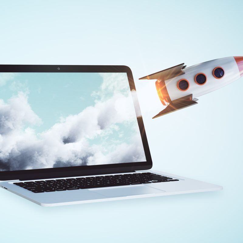 WordPress Website Speed concept - rocket leaving a laptop